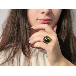 Photo of worn Black Dome Ring Peridot Green Rose Gold