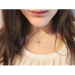 Photo of worn Armony Cross