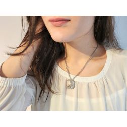 Photo of worn Moon and Star Necklace with Diamonds