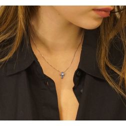 Photo of worn Blue sapphire cross necklace - Width 8.3mm