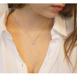 Blue sapphire flower necklace photo of worn