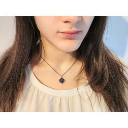 Photo of worn Sphere pendant Necklace with blue and white cubic zirconia