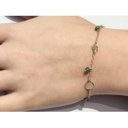 Bracciale con pietre verdi e dischi oro giallo  foto indossata