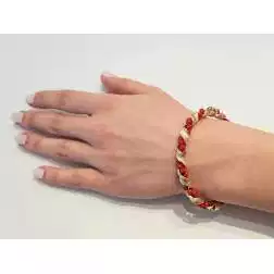 Bracciale con sfere Rosse con Spirale in oro Giallo foto indossata