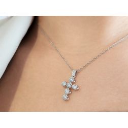 Photo of worn Cross pendant with 6 diamonds