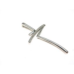 Offset cross in white gold with diamonds
