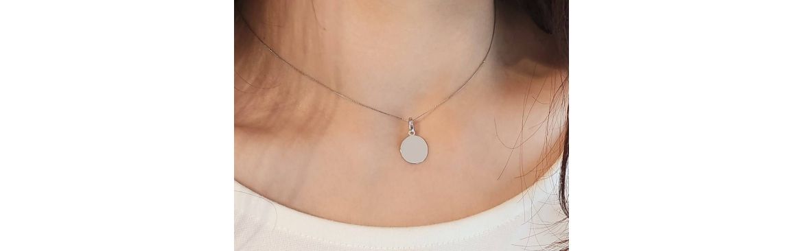 18kt gold pendants that can be personalized with engraving.